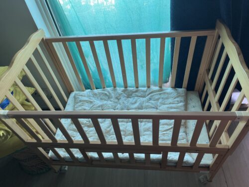 Gently Used expandable Baby hug wooden cot