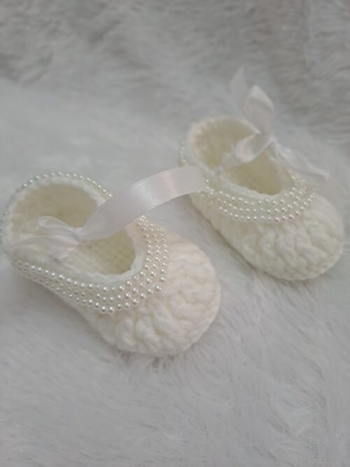 Crochet baby girl booties with beads.
