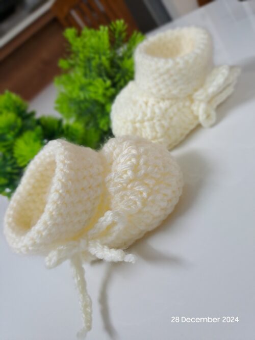 Crochet handmade baby shoes.