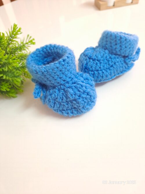 Crochet handmade baby shoes.