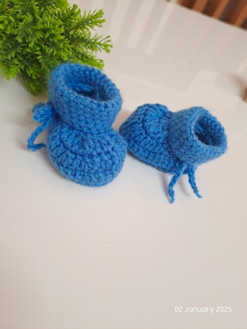 Crochet handmade baby shoes.